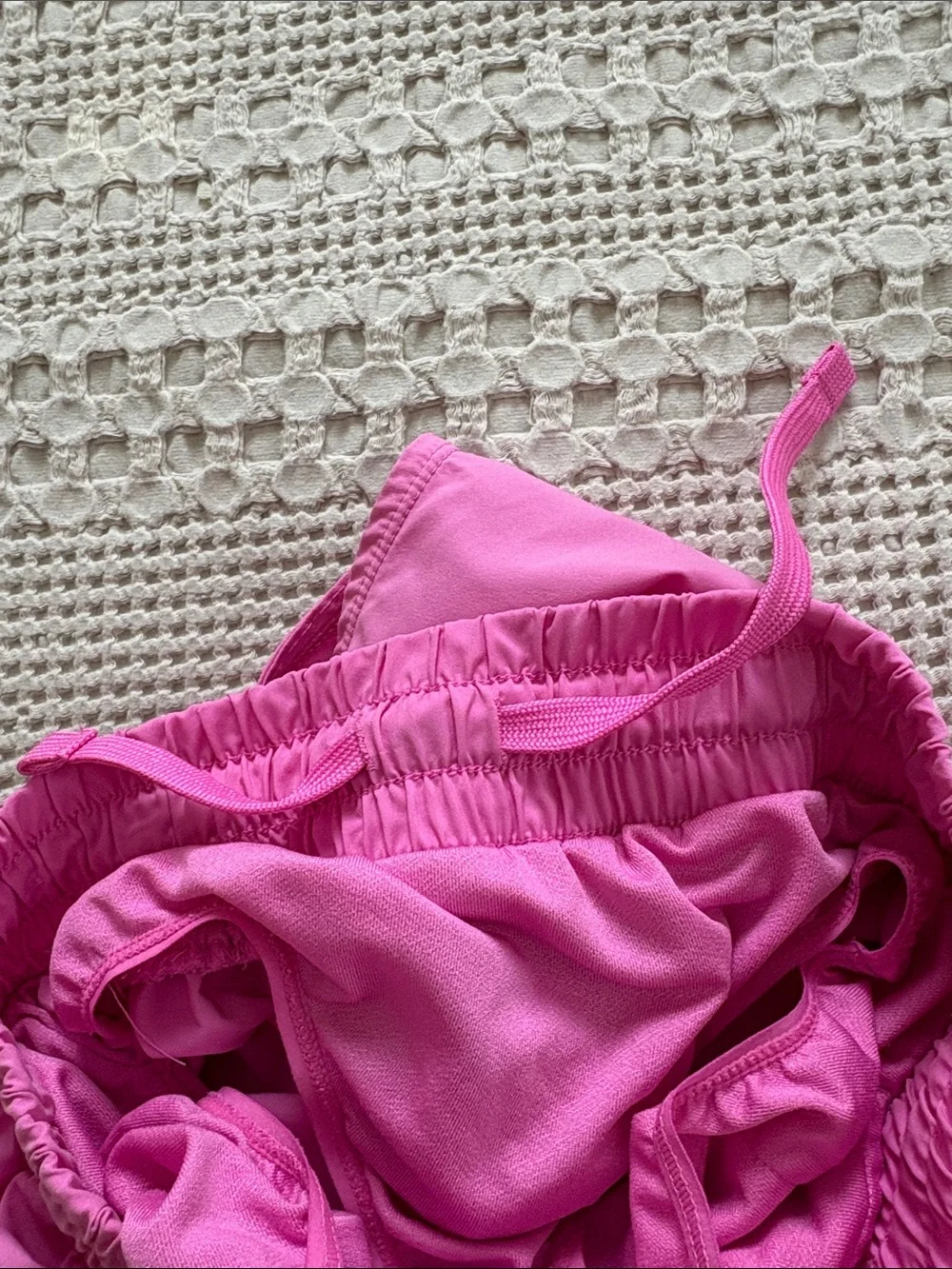 Nike Girl’s Pink Athletic Shorts with White Swoosh